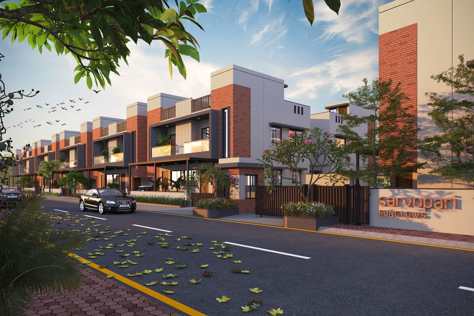 Sarvopari Bunglows at Kadi — the approach avenue, planted so the houses are reached rather than arrived at