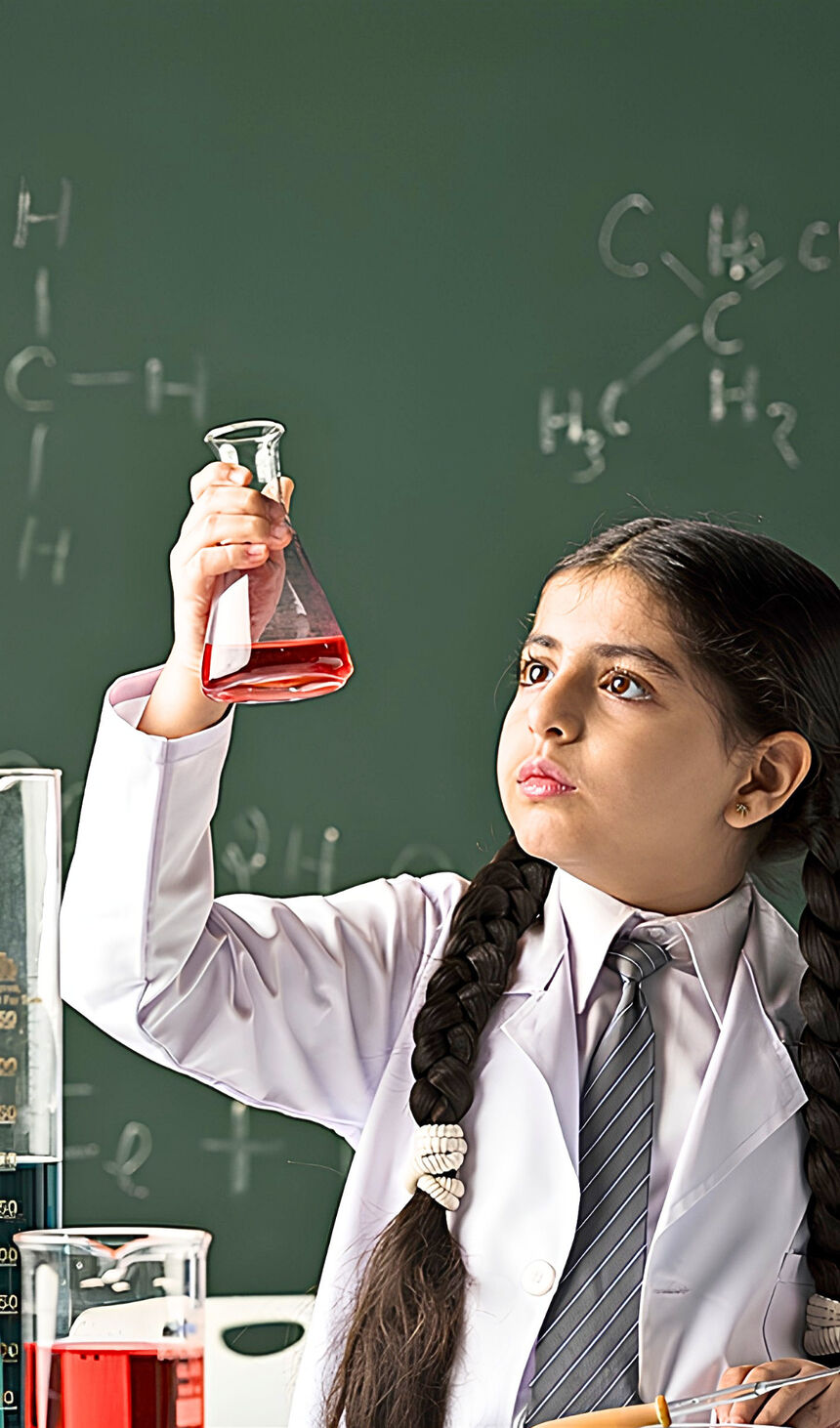 A pupil in a school laboratory